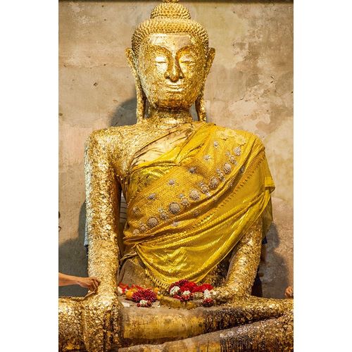 Thailand-Samut Songkhram Province-Amphawa District Buddha statue covered with gold leaf offerings